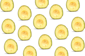 Seamless half avocado pattern on white background. Top view. Flat lay