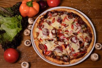 pizza with mushrooms and tomatoes