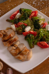 warm salad with meat and cheese