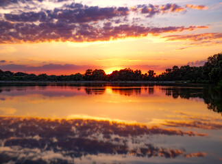colorful intense sunset over lake