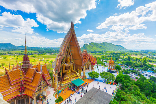 Big golden Buddha statue in Tiger cave temple (Wat thum suea), a buddhist temple of Kanchanaburi Province, Thailand