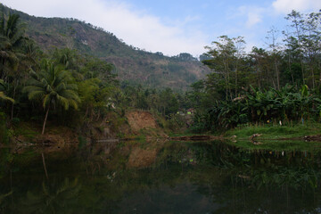 Small lake with views of the hills