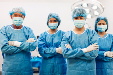 Portrait of professional anesthesiologist doctor medical team and assistant standing with surgery...
