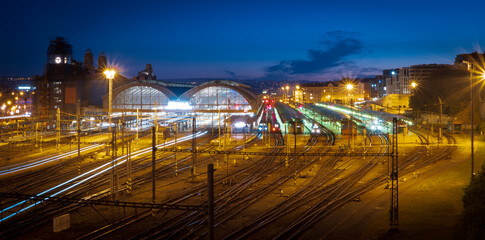 night view of european prague main train station with traffic long exposure shot