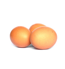 Three chicken eggs isolated on white background