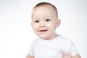 Portrait of a eleven-month-old baby on a white background