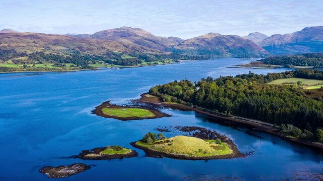 aerial view of the falls of lora near connel, connel bridge and oban in the argyll region of the highlands of scotland during a clear blue autumn day