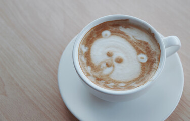 Cup of latte on wooden table. Latte Art. 