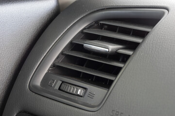 Air conditioner vent grill in a modern car