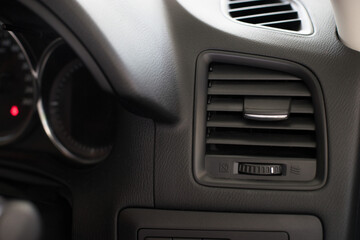 Air conditioner vent grill in a modern car