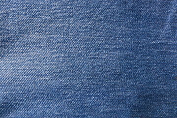 Fototapeta na wymiar Classic blue denim jeans texture. Blue jeans texture.