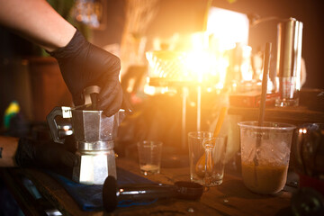 Hand pour coffee from Moka Pot coffee. Coffee shop in Asia.