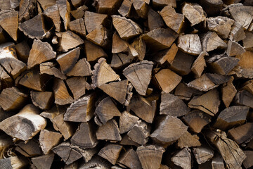 Wall with firewood, wooden background, banner