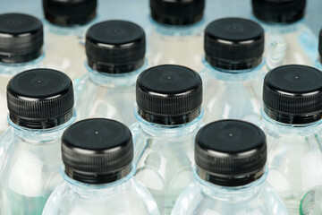 Drinking mineral water bottles filled with plastic wrap