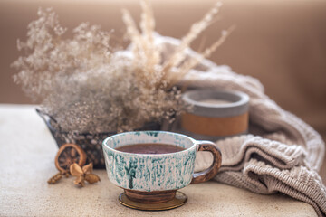 Obraz na płótnie Canvas Cozy home still life with a Cup of tea on the table.