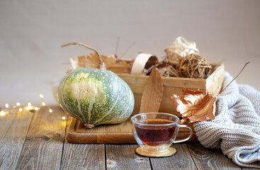Cozy still life with tea and decorative items