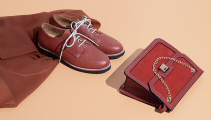 Vintage scene stylish shoes and clutch in isometric on beige background. Minimal fashion retro shopping sale concept. Vintage shop.