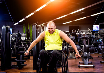 Disabled man training in the gym of rehabilitation center