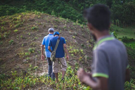 Men walking on a hill top in Chittagong Bangladesh