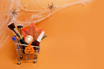 Female cosmetics sales discount on Halloween background with spider web, copy space for your text.