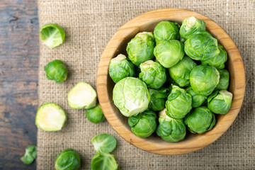 Brussels sprouts in a wooden bowl. Harvesting.