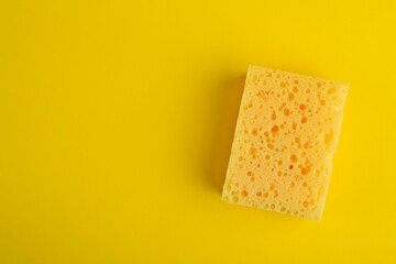 Kitchen washcloth on yellow background. Sponges. Washcloths for cleaning.