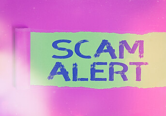 Conceptual hand writing showing Scam Alert. Concept meaning unsolicited email that claims the...