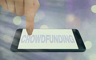 Conceptual hand writing showing Crowdfunding. Concept meaning practice obtaining needed funding by...