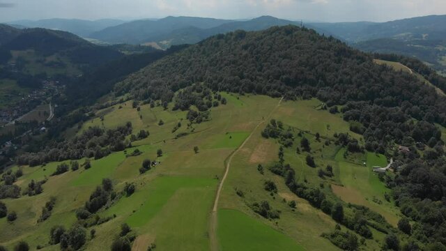 Flying in Beskid Sadecki in pass between Piwniczna and Lomnica towards mountain Kicarz, Poland