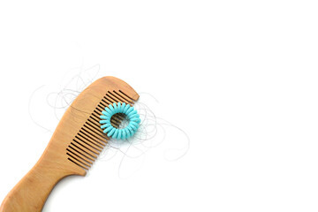 Hair loss, hair fall everyday serious problem, girl with a comb and problem hair on white background.	
