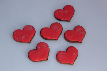 heart shaped candles. heart shaped chocolates. heart shaped cake 
