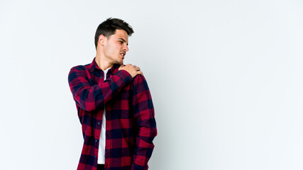 Young caucasian man isolated on white background having a shoulder pain.