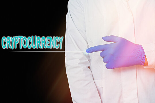 Conceptual hand writing showing Cryptocurrency. Concept meaning form of currency that exists digitally has no central issuing Displaying Sticker Paper Accessories With Medical Gloves On