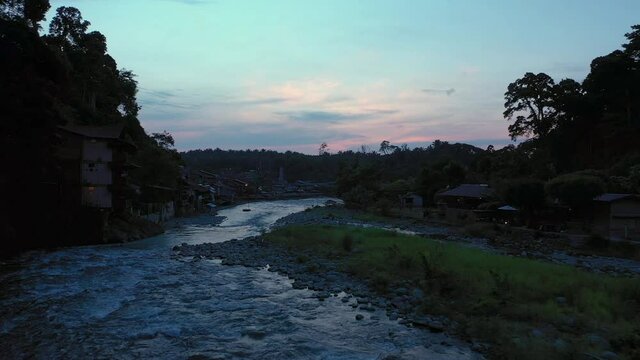 Aerial view above Bahorok River in the tourist village of Bukit Lawang in Gunung Leuser National Park, the Tropical Rainforest Heritage of Sumatra, Indonesia at dawn
