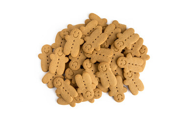 a pile of gingerbread men cookies isolated on white