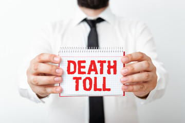 Word writing text Death Toll. Business photo showcasing the number of deaths resulting from a...