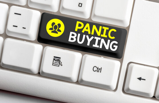 Writing note showing Panic Buying. Business concept for buying large quantities due to sudden fear of coming shortage Colored keyboard key with accessories arranged on empty copy space