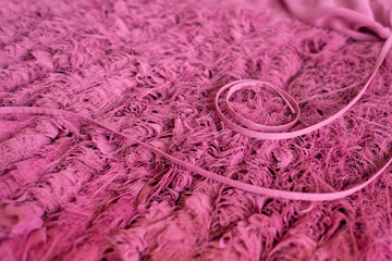  Cyclomen color textile background. On the fleecy light texture, the stitched ribbons are beautifully laid out in tone. Elegant pink textures.