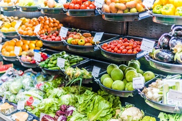 Fresh vegetables and fruits put up for sale in supermarket