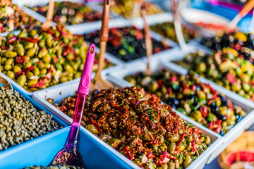 Assorted olives put up for sale on the italian street stall