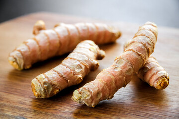 Turmeric root on a cutting board