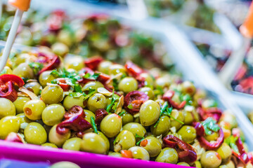 Assorted olives put up for sale on the italian street stall