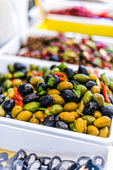 Assorted olives put up for sale on the italian street stall