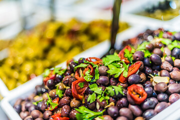 Assorted olives put up for sale on the italian street stall