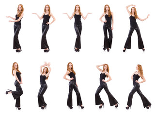 Fototapeta premium Redhead woman in black bell bottom pants on white