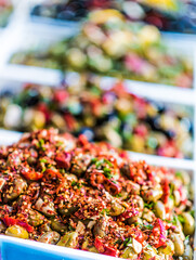 Assorted olives put up for sale on the italian street stall