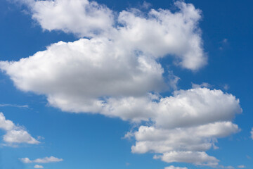 Naklejka na ściany i meble Summer bright blue sky with clouds .