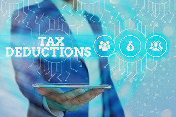 Conceptual hand writing showing Tax Deductions. Concept meaning an amount or cost that subtracted from someone s is income System administrator control, gear configuration settings