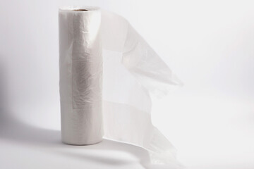 White plastic bag in roll isolated on white
