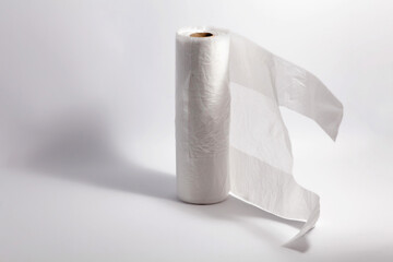 White plastic bag in roll isolated on white